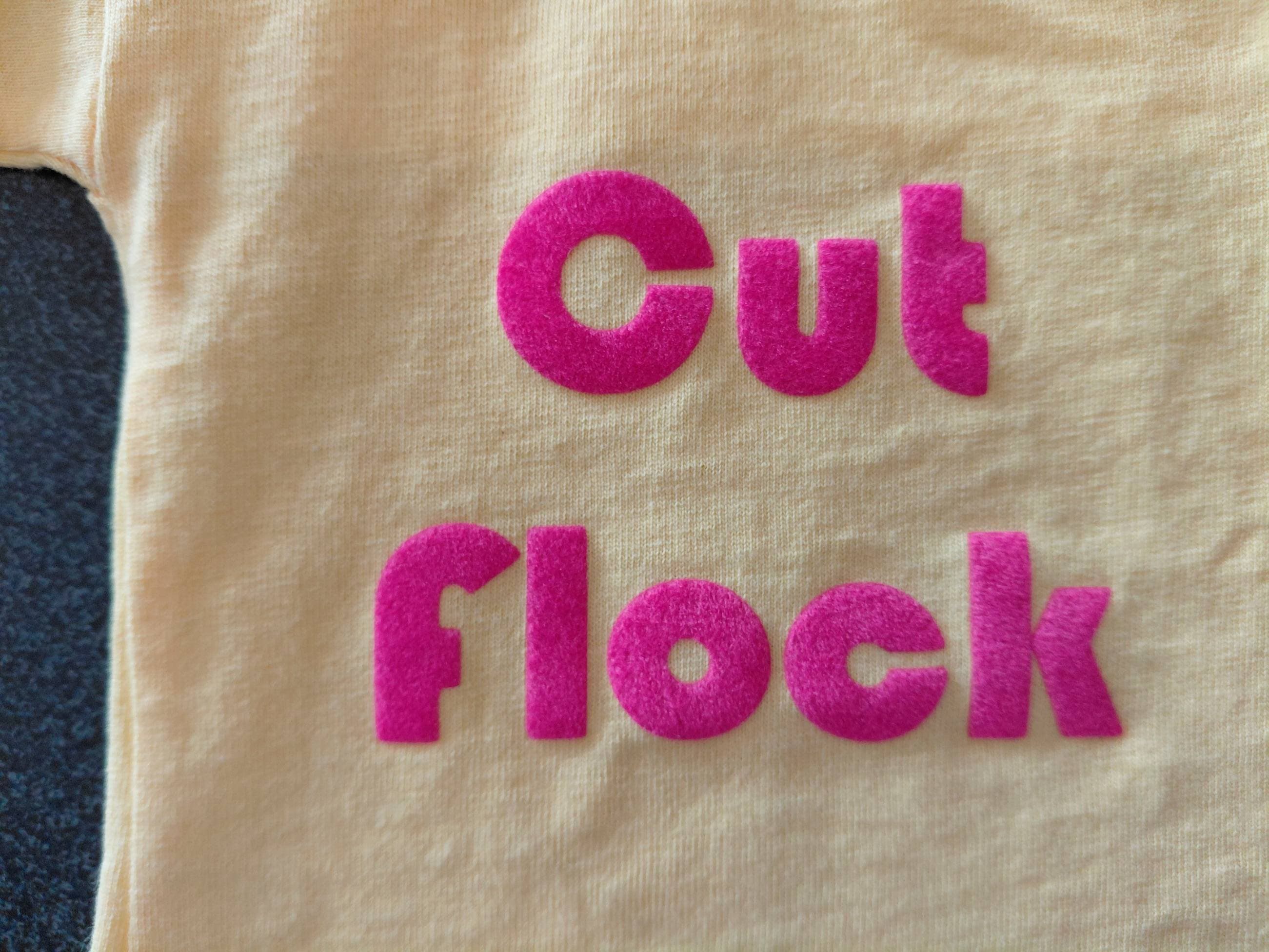 CAD cut vinyl lettering on workwear jacket
